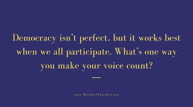 Democracy isn't perfect - an image on a blue background with yellow writing., Michael Thacker . net